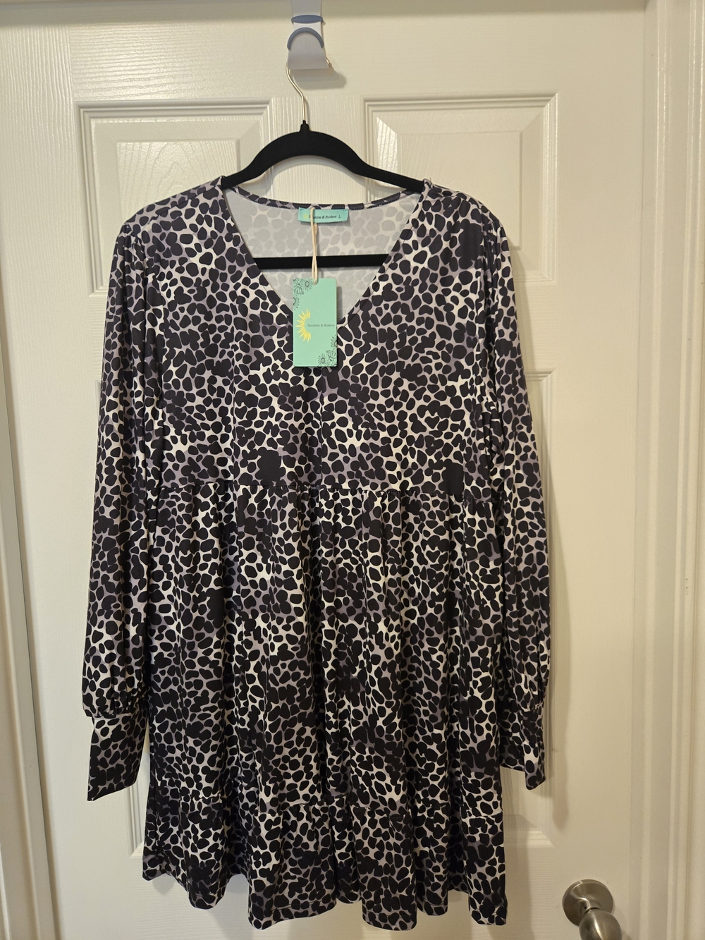 Tiered V-Neck Mini Dress in Black and White Leopard Print